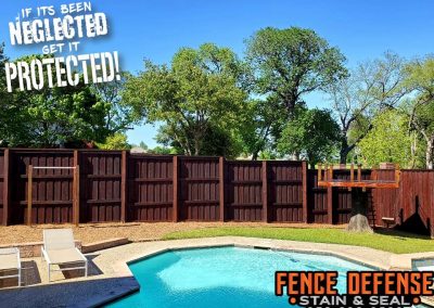 Dark Stained Fence By Backyard Pool