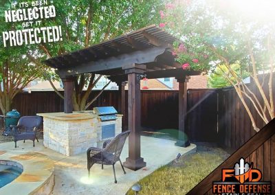 Dark Stained Pergola with Outdoor Kitchen