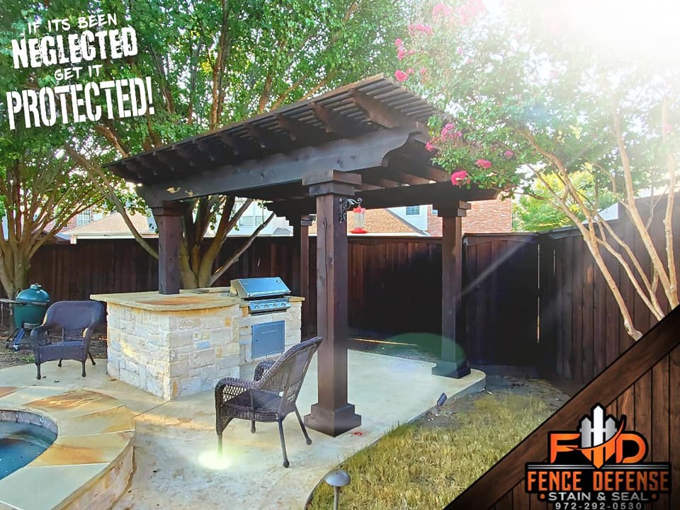 Dark Stained Pergola with Outdoor Kitchen